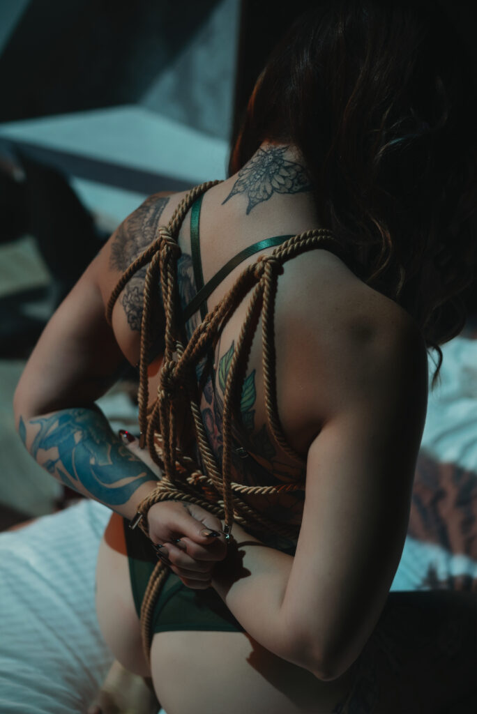 woman in shabari rope on bed